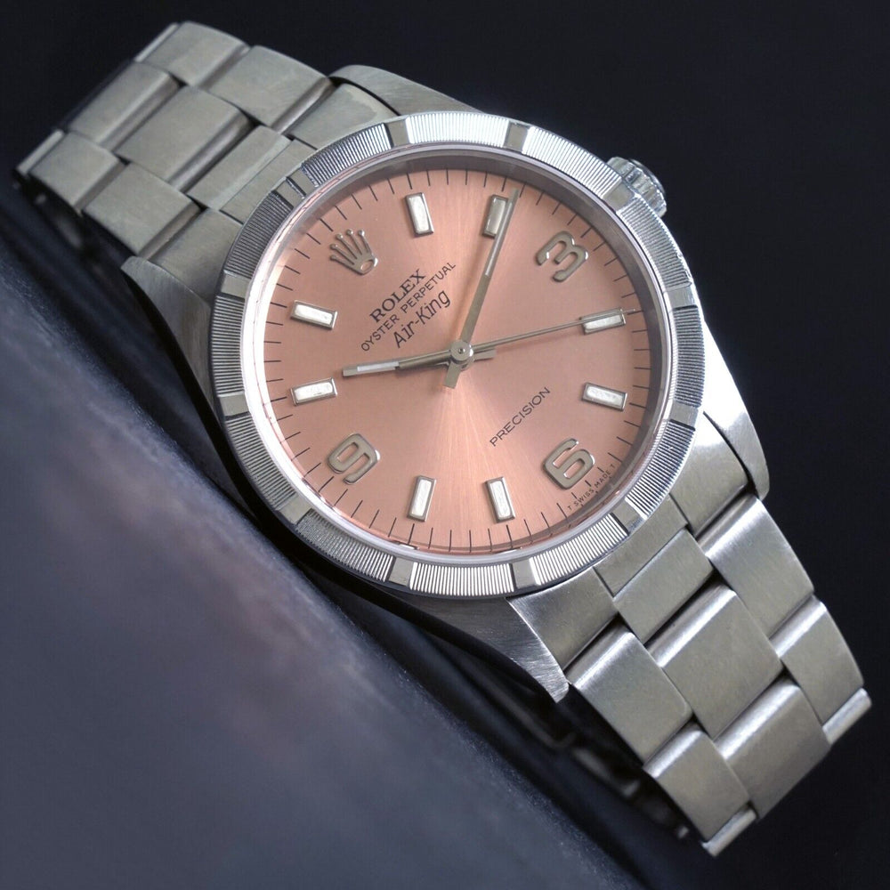 Stunning 2000 Rolex 14010 Air King Stainless Steel Pink Dial Engine Turned Watch, Olde Towne Jewelers, Santa Rosa CA.