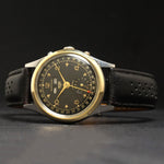 Rare Heuer Baylor Steel & Yellow Gold Man's Triple Date Watch Black Gilt Dial, Olde Towne Jewelers, Santa Rosa CA.