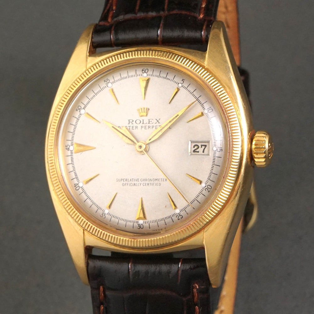 Stunning 1950 Rolex 6031 Ovettone 18K Yellow Gold Mans Roulette Wheel Date Watch, Olde Towne Jewelers, Santa Rosa CA.
