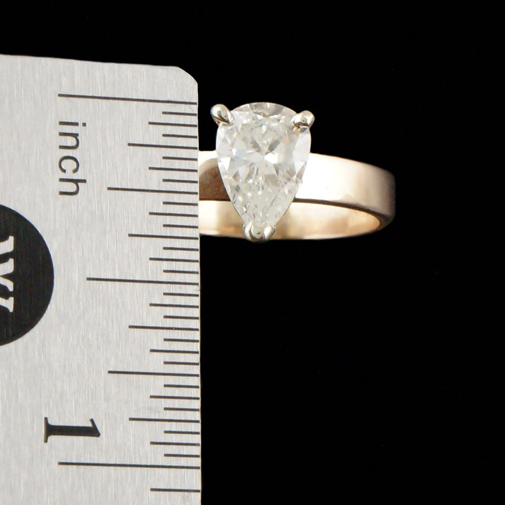 Solid 14K Yellow Gold & 1.70 Ct. Pear Shape Diamond Solitaire Engagement Ring, Olde Towne Jewelers, Santa Rosa CA.