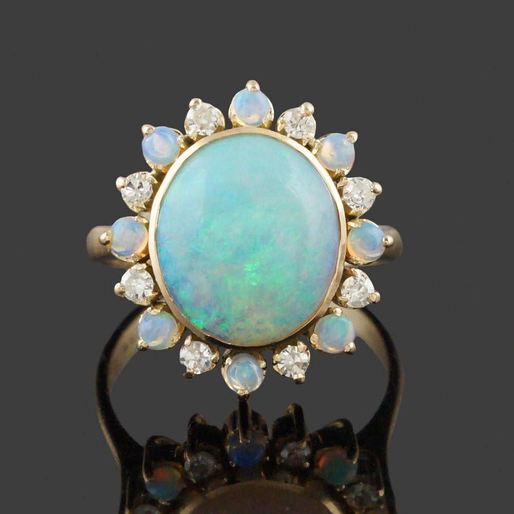 Solid 14K Yellow Gold, Oval Opal Cabochon & Diamond Halo Estate Cocktail Ring, Olde Towne Jewelers, Santa Rosa CA.