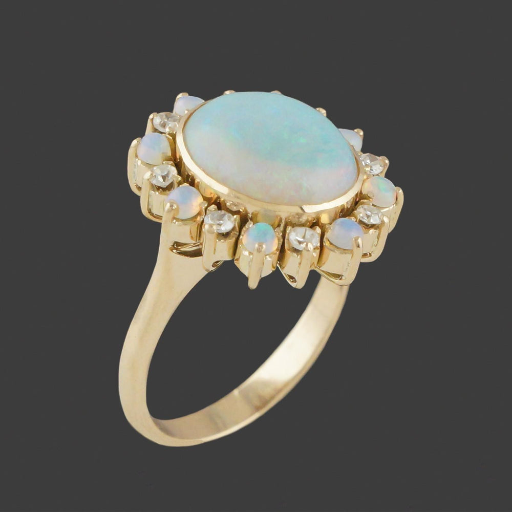 Solid 14K Yellow Gold, Oval Opal Cabochon & Diamond Halo Estate Cocktail Ring, Olde Towne Jewelers, Santa Rosa CA.