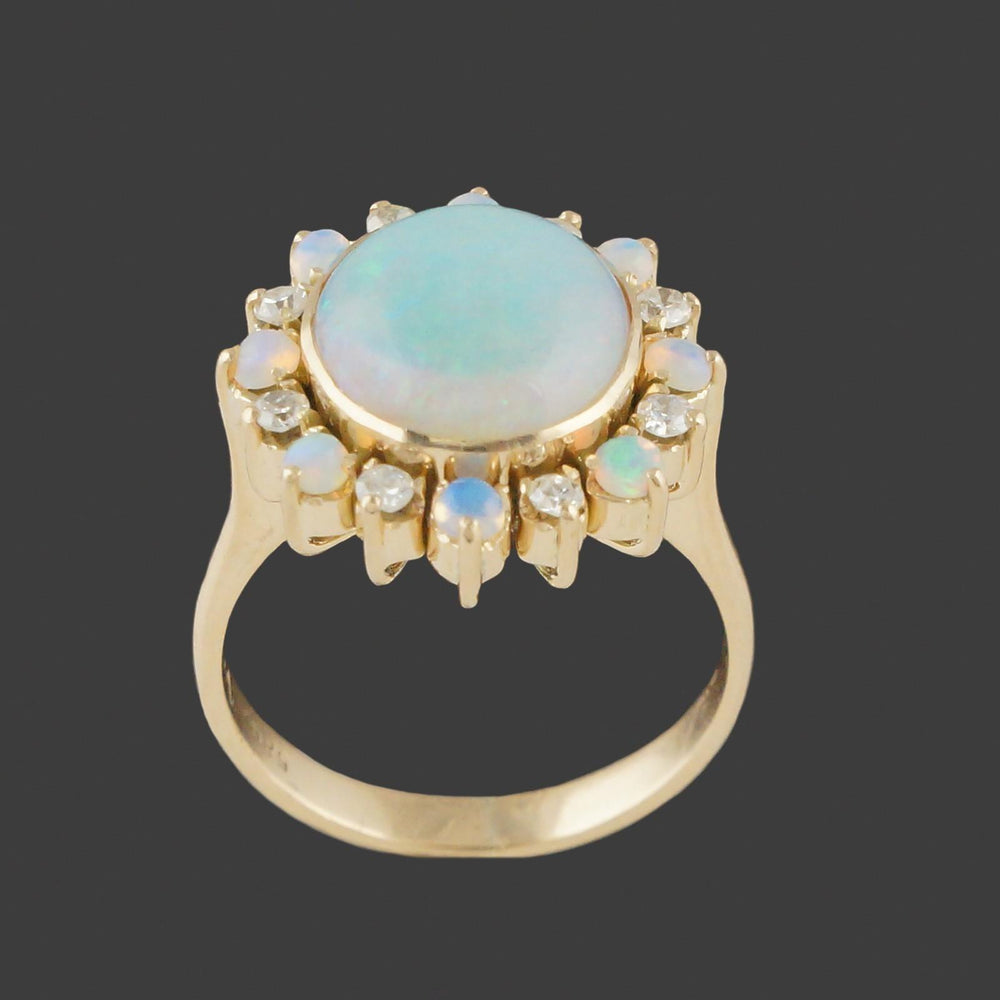 Solid 14K Yellow Gold, Oval Opal Cabochon & Diamond Halo Estate Cocktail Ring, Olde Towne Jewelers, Santa Rosa CA.