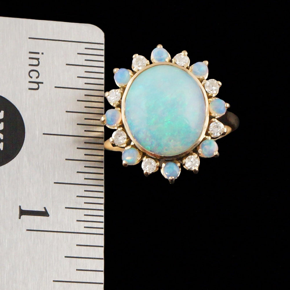Solid 14K Yellow Gold, Oval Opal Cabochon & Diamond Halo Estate Cocktail Ring, Olde Towne Jewelers, Santa Rosa CA.