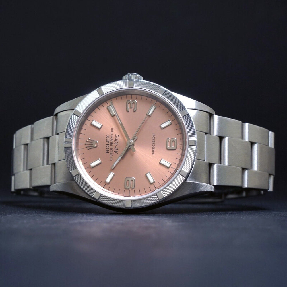 Stunning 2000 Rolex 14010 Air King Stainless Steel Pink Dial Engine Turned Watch, Olde Towne Jewelers, Santa Rosa CA.