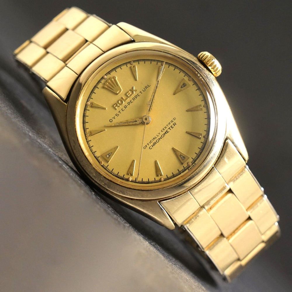 Stunning 1950s Rolex 6084 Solid 14K Gold Semi Bubbleback Watch GF Bracelet XLNT Olde Towne Jewelers, Santa Rosa CA.