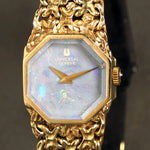 Universal Geneve Solid 14K Yellow Gold & Opal Dial Woman's Bracelet Watch, Olde Towne Jewelers, Santa Rosa CA.