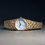 Universal Geneve Solid 14K Yellow Gold & Opal Dial Woman's Bracelet Watch, Olde Towne Jewelers, Santa Rosa CA.