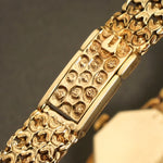 Universal Geneve Solid 14K Yellow Gold & Opal Dial Woman's Bracelet Watch, Olde Towne Jewelers, Santa Rosa CA.