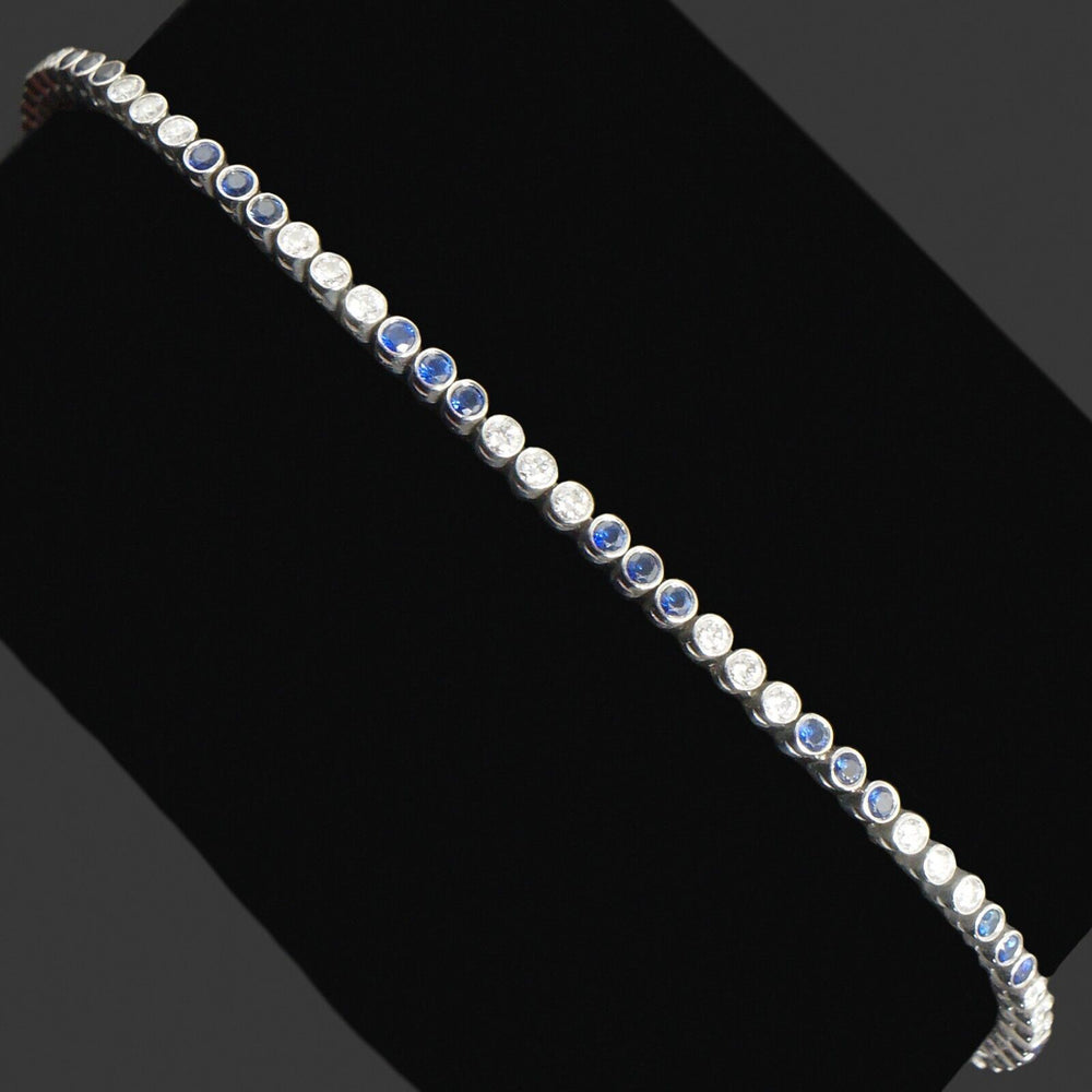 Tiffany & Co. Platinum 1.80 CTW Blue Sapphire & 1.00 CTW Diamond Tennis Bracelet, Olde Towne Jewelers, Santa Rosa CA.