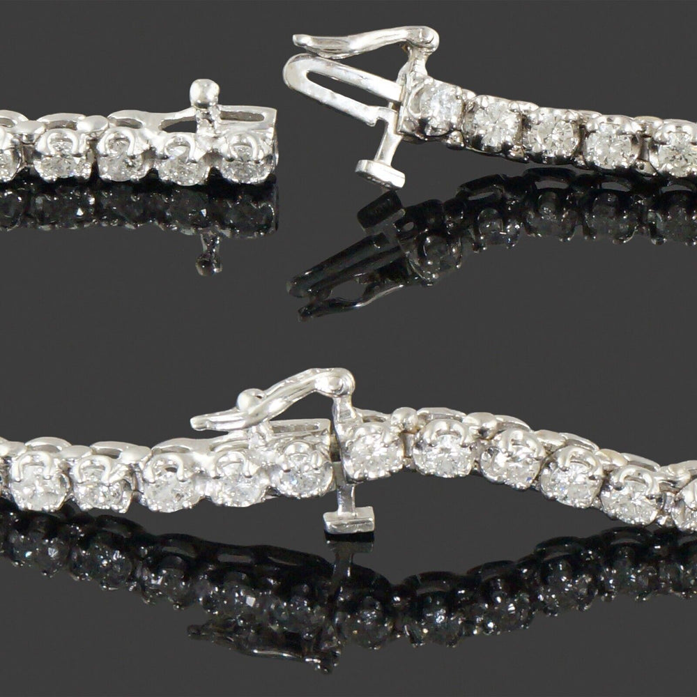 Elegant Solid 18K White Gold & 3.43 CTW Diamond Line 7" Estate Tennis Bracelet, Olde Towne Jewelers, Santa Rosa CA.