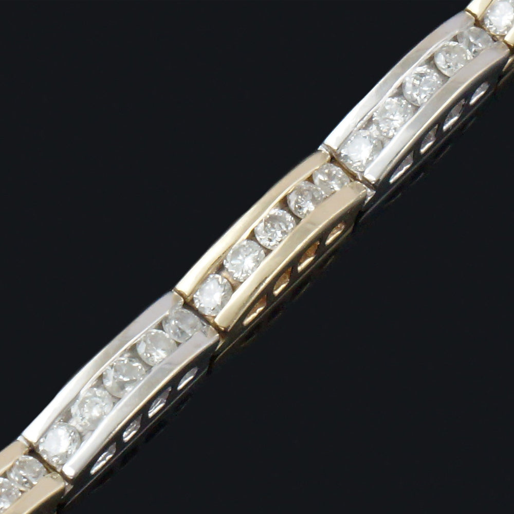 Elegant Two Tone 14K Gold & 5.0 CTW Channel Diamond Line Link 7" Tennis Bracelet, Olde Towne Jewelers, Santa Rosa CA.