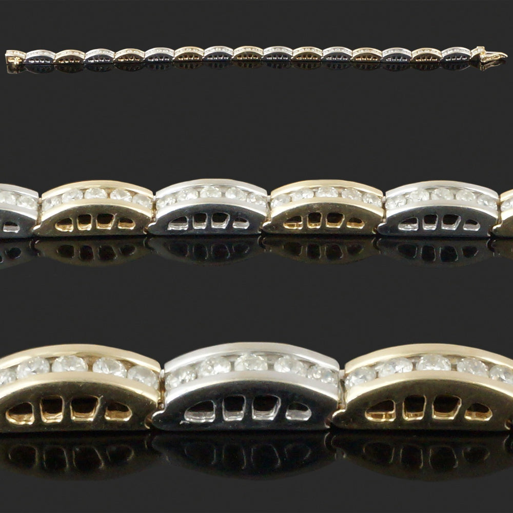 Elegant Two Tone 14K Gold & 5.0 CTW Channel Diamond Line Link 7" Tennis Bracelet, Olde Towne Jewelers, Santa Rosa CA.