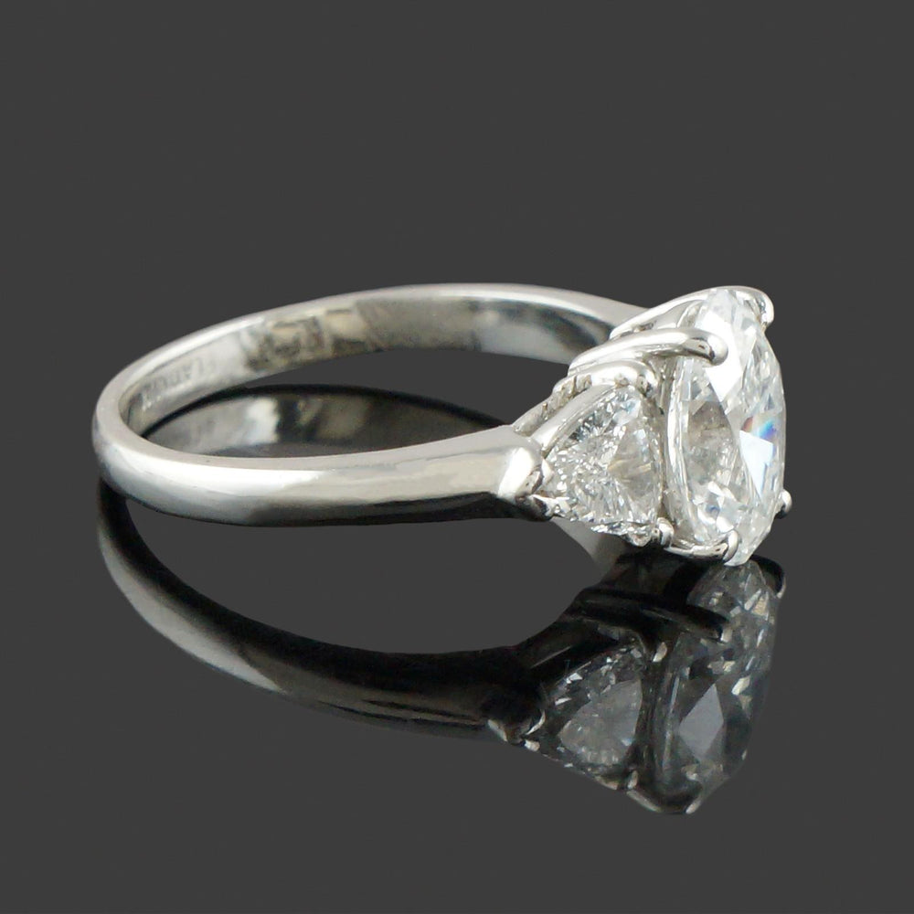 Elegant Platinum, 3.25 CTW Oval & Trillion Diamond Three Stone Engagement Ring, Olde Towne Jewelers, Santa Rosa CA.
