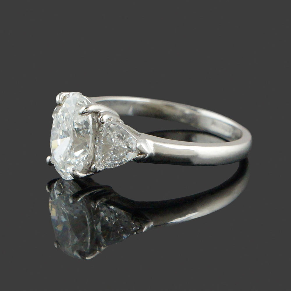 Elegant Platinum, 3.25 CTW Oval & Trillion Diamond Three Stone Engagement Ring, Olde Towne Jewelers, Santa Rosa CA.