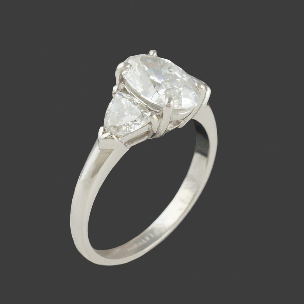 Elegant Platinum, 3.25 CTW Oval & Trillion Diamond Three Stone Engagement Ring, Olde Towne Jewelers, Santa Rosa CA.