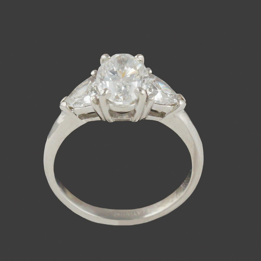 Elegant Platinum, 3.25 CTW Oval & Trillion Diamond Three Stone Engagement Ring, Olde Towne Jewelers, Santa Rosa CA.