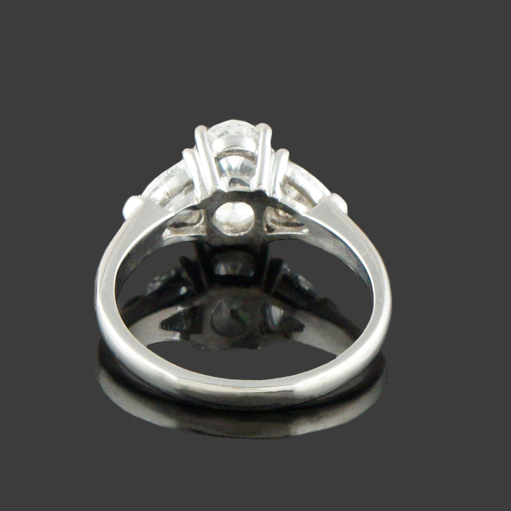 Elegant Platinum, 3.25 CTW Oval & Trillion Diamond Three Stone Engagement Ring, Olde Towne Jewelers, Santa Rosa CA.