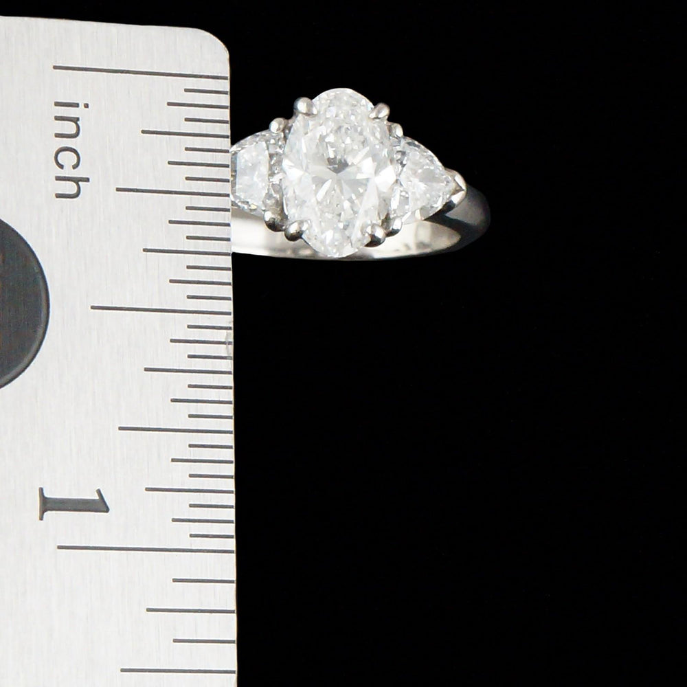 Elegant Platinum, 3.25 CTW Oval & Trillion Diamond Three Stone Engagement Ring, Olde Towne Jewelers, Santa Rosa CA.