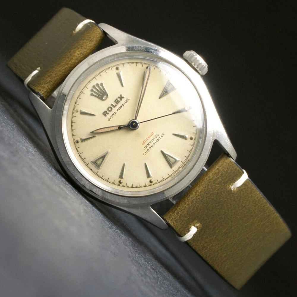 Rare 1950s Rolex 6106 Oyster Perpetual Red Officially Stainless Steel Watch