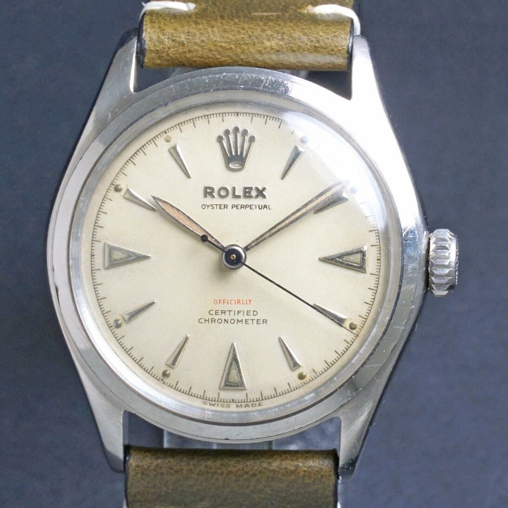 Rare 1950s Rolex 6106 Oyster Perpetual Red Officially Stainless Steel Watch