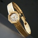 Vintage Omega Octagonal Solid 14K Gold Lady's Bracelet Watch, Linen Dial, Olde Towne Jewelers, Santa Rosa CA.