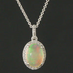 Solid 14K White Gold, 1.5 Ct Opal & .20 CTW Diamond Halo Pendant, 18" Necklace, Olde Towne Jewelers, Santa Rosa CA.
