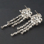 Solid 18K White Gold & .78 CTW Diamond Filigree Bow Chandelier Dangle Earrings, Olde Towne Jewelers, Santa Rosa CA.