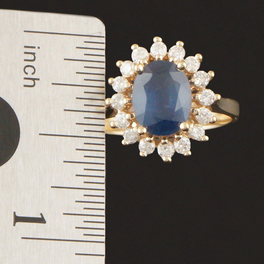 Solid 14K Yellow Gold 1.90 Ct Blue Sapphire .45 CTW Diamond Halo Engagement Ring, Olde Towne Jewelers, Santa Rosa CA.