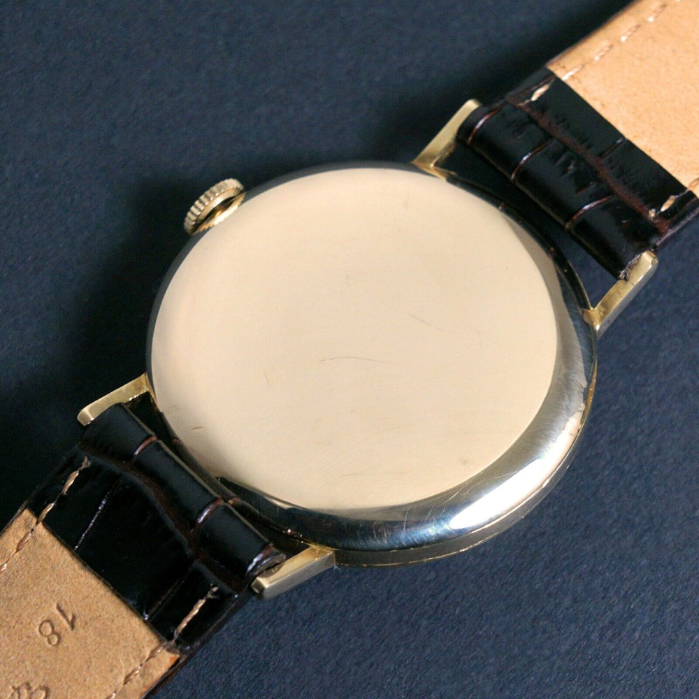 Stunning Rare 1940s Omega Large 14K Gold Man's Watch Orig Black Gloss Gilt Dial, Olde Towne Jewelers, Santa Rosa CA.