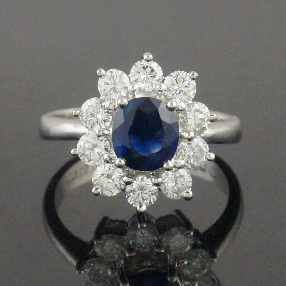 Spectacular Platinum 1.50 Ct Sapphire & 1.20 CTW Diamond Halo Engagement Ring